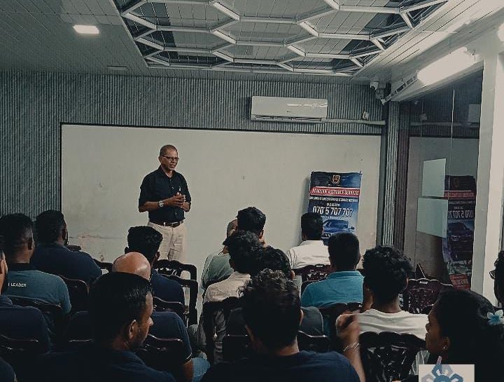 Participants attending an AUSS workshop presentation